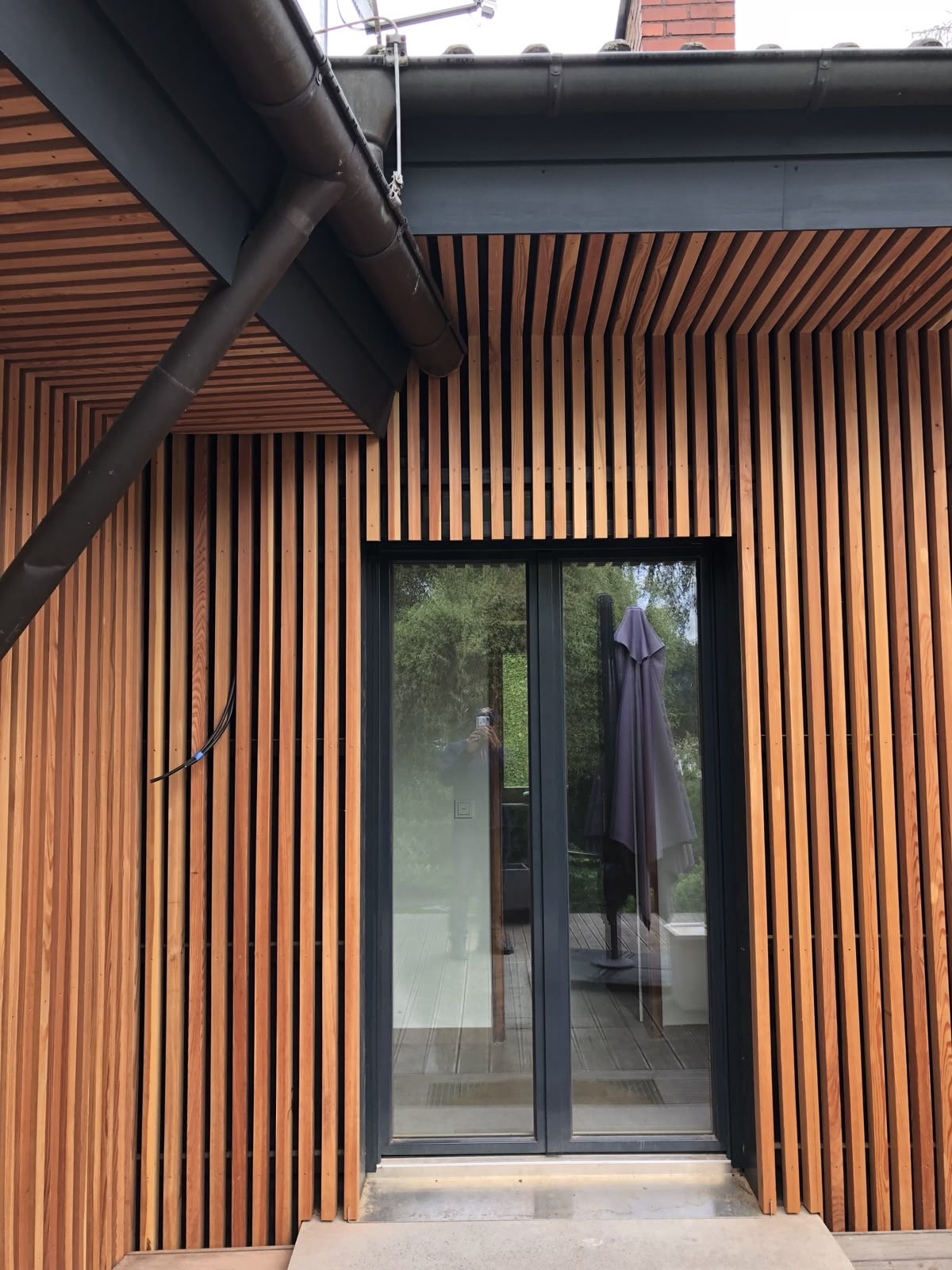 Timber slat cladding at a garden room entrance